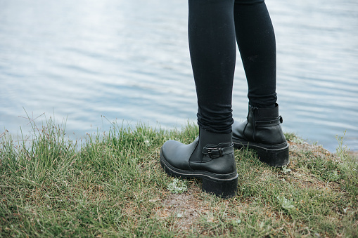 Woman taking some time for enjoy the cold weather at lake