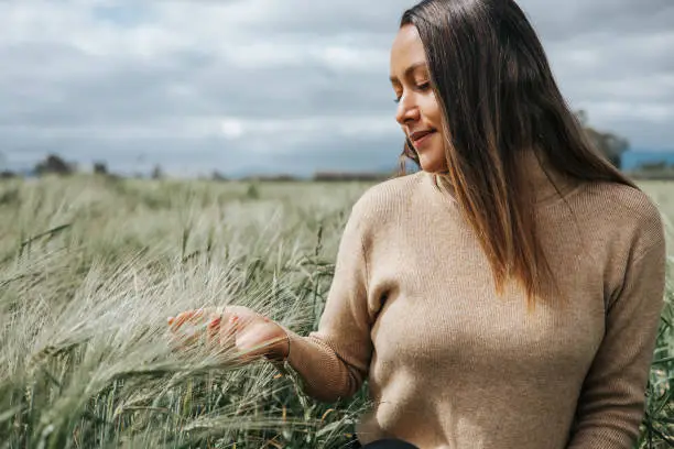 woman enjoying the seed sown field