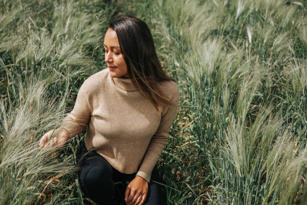 istock woman enjoying the seed sown field 1428798883