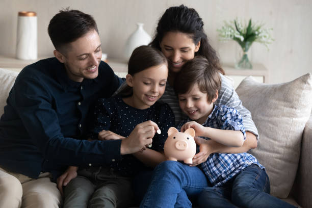istock Happy family saving money for future purchase 1428799701