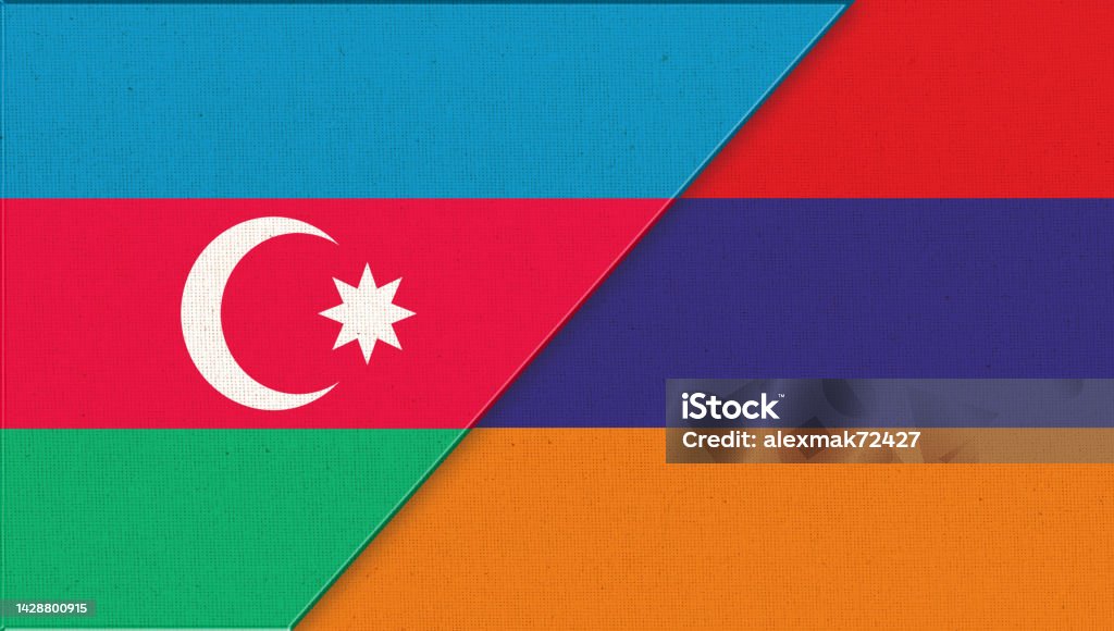Military conflict between Azerbaijan and Armenia. Two Flag Together War in Nagorno-Karabakh. Military conflict between Azerbaijan and Armenia. Two Flag Together - Fabric Texture. Double flag of two Caucasus states. Azerbaijani and Armenian state flags Asia Stock Photo