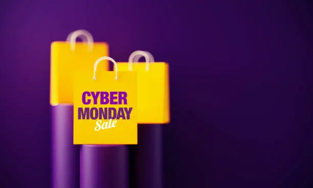 Photo of Cyber Monday Written Yellow Shopping Bags Sitting On Purple Podiums Before Purple Background