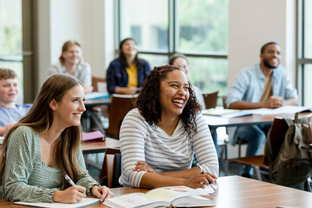 istock The diverse group of students smile and laugh during presentation 1428802051