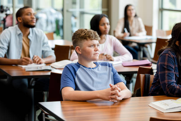 istock Serious diverse group listens to lecture 1428802054