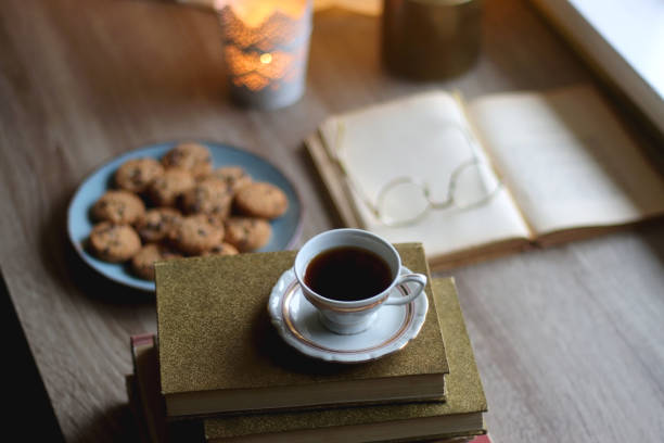 istock Cookies, Tea, Books and Candle 1428805450