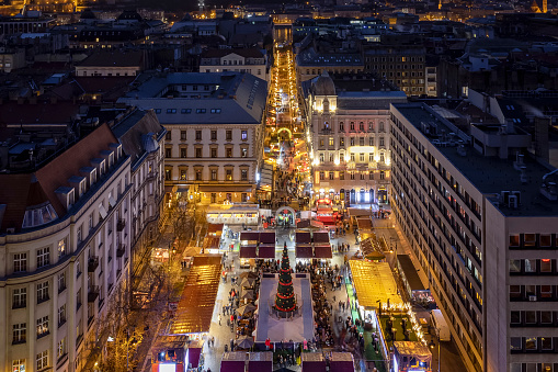 Elevated night view of the famous Christmas market at the St. Stephans Dome and Square at the old town of Budapest, Hungary