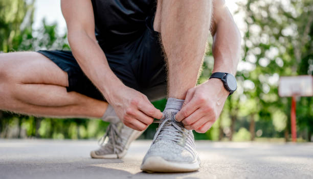 istock Man doing workout outdoors 1428813959