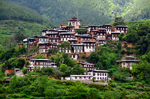 Rinchengang, Thimphu region, Bhutan: located across the Puna Tsang Chhu river from Wangdue Phodrang / Wangdi, along the Punakha- Bumthang highway - a cluster of old traditional rammed-earth buildings etched against the hill-side. The village is known for having its houses built close to each other,