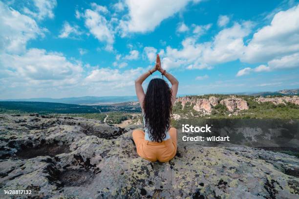 Beautiful Woman Is Meditating Doing Yoga In Ancient Ruins Of Smll Midas City In The Phrygian Valley In Phrygia Turkey Stock Photo - Download Image Now