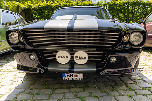 Sitting inside a vintage car