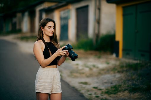 Women Photographer on the street in summer