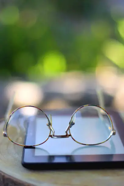 Photo of E-Reader and Glasses