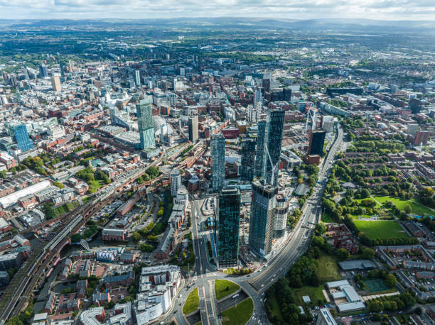 Aerial view of Manchester city in UK Aerial view of Manchester city in UK manchester england stock pictures, royalty-free photos & images