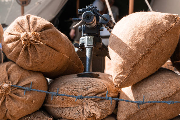 istock clasic war rifle on a war trench 1428826754