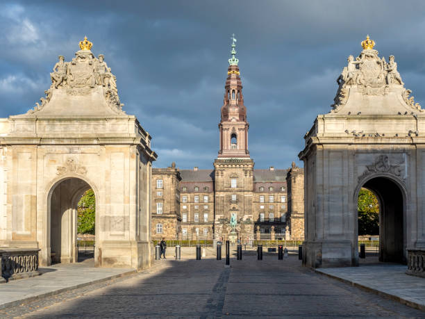 Gatehouse pavilions to Chistiansborg Palace Copenhagen, Denmark - Oct 19, 2018: Gatehouse pavilions to Chistiansborg Palace. Classic European architectural building design. Adjacent to Frederiksholms Canal at Slotsholmen. sentinel spire stock pictures, royalty-free photos & images