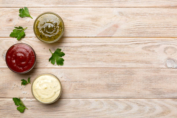 istock Many different sauces and herbs on table, flat lay top view. sauces with spices healthy concept 1428834937