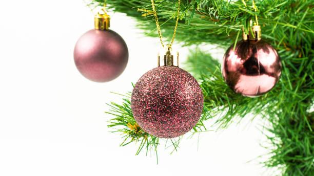 istock Christmas tree with shiny decorations on white background. Christmas concept idea. Winter holiday season 1428835869