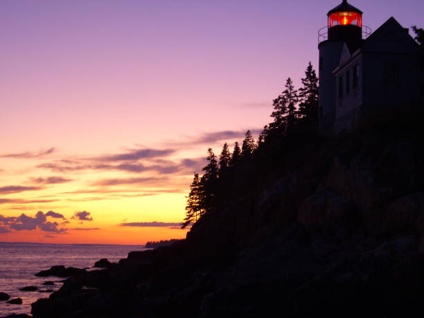 istock Bass Harbor Head Lighthouse at sunset in Maine 1428837404