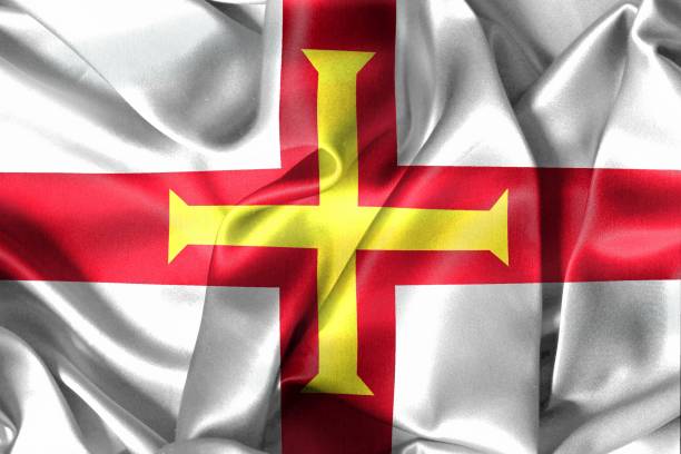 istock Guernsey flag - realistic waving fabric flag 1428837576