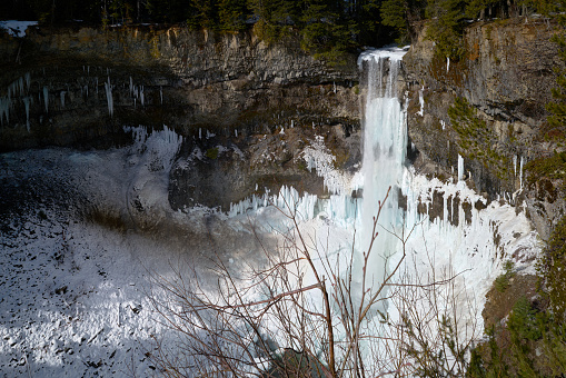Spectacular Brandywine Falls in winter near Whistler, British Columbia, Canada.