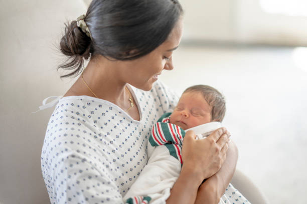istock Newborn and His Mother 1428852192