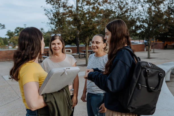 istock Teacher giving lessons outside the classroom 1428860723
