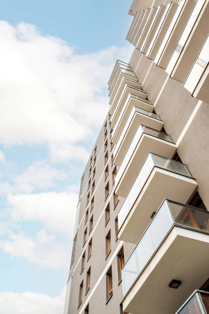istock Modern Apartments with Balconies Against Clear Sky 1428863621