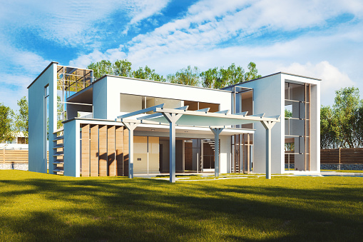 3d rendering of modern cozy house with garage for sale or rent with large garden and lawn. Clear sunny summer day with cloudless sky.