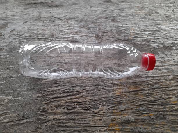 istock plastic bottle trash on the street top view 1428865930