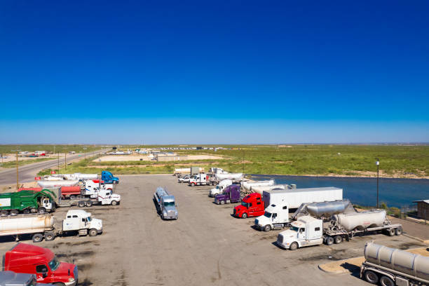 istock Semi trucks parked on a resting station in Texas, USA - drone 1428902961