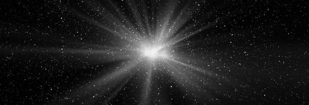 istock Burst of light in space. Night black starry sky horizontal background banner 1428914552
