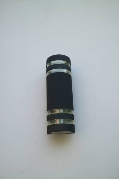 istock Tubular black decorative lamp attached to the wall 1428919942