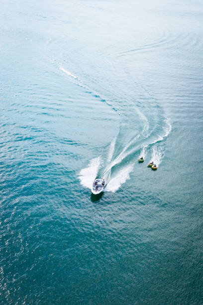 istock Fun rubber ring tubing on a motorboat. 1428927232