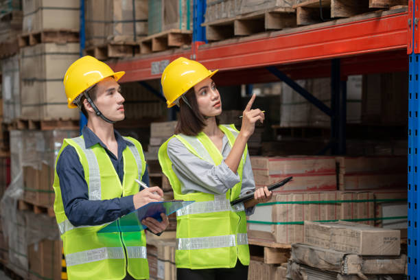 istock Warehouse worker working together in warehouse 1428933323
