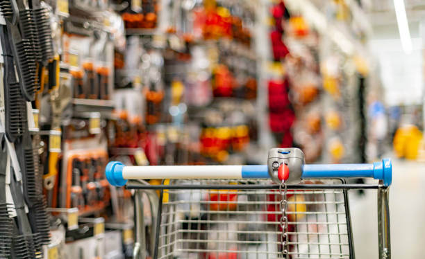 istock A shopping cart by a store shelf in a hardware store 1428935582