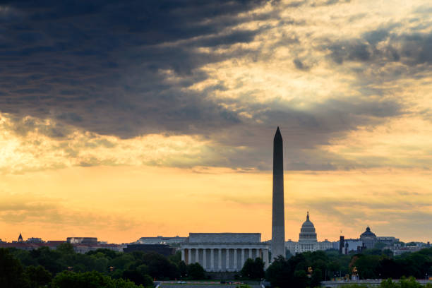 istock View of Washington DC Skyline at sunrise with clouds 1428938531