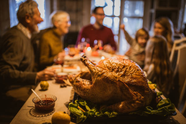 istock Close up of Thanksgiving turkey on dining table. 1428939290