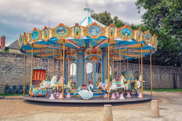 Colorful carousel in the city stock photo