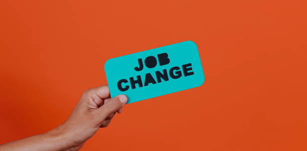 istock holds a sign with the text job change 1428947879