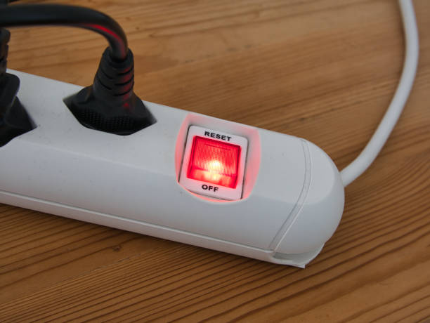 istock White power strip with cables, red illuminated power switch 1428956666
