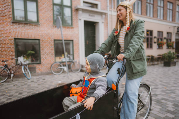 istock Little boy's going Halloween hunt on a cargo bike 1428960258