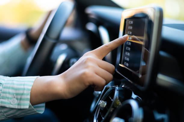 istock Asian young woman driving car 1428975408