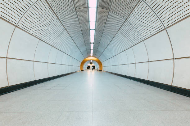 Modern architecture and symmetrical tunnels on the newly built Elizabeth line on the London underground transport network in London, UK.