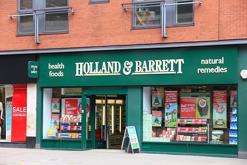 Holland & Barrett health food store High Holborn street, London, UK. Holland & Barrett is owned by LetterOne Holdings.