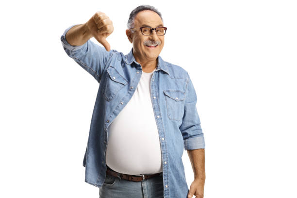 istock Sarcastic mature man gesturing thumbs down 1428995668