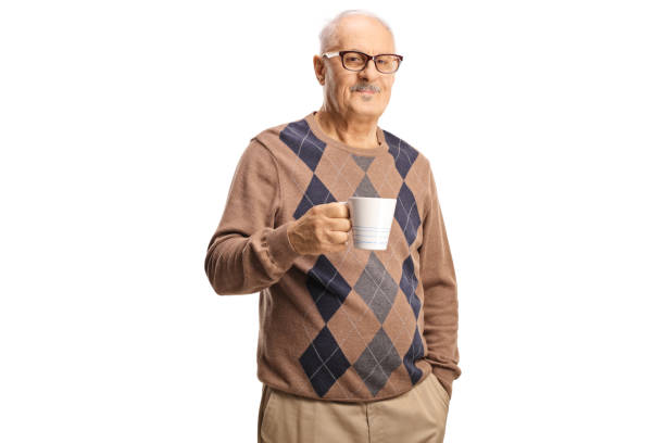 istock Mature man holding a cup of tea 1428995721