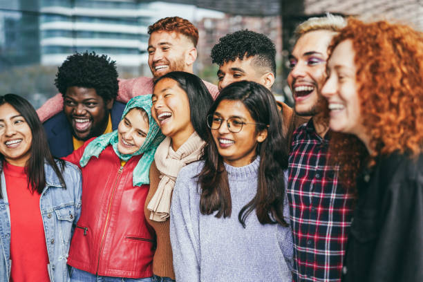 istock Young diverse people having fun outdoor laughing together - Diversity concept 1428996321