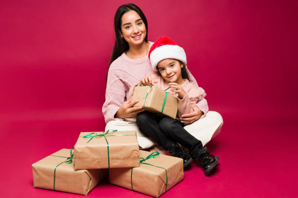 240+ Happy Hispanic Mom Opening Christmas Presents With Her Family Stock  Photos, Pictures & Royalty-Free Images - iStock