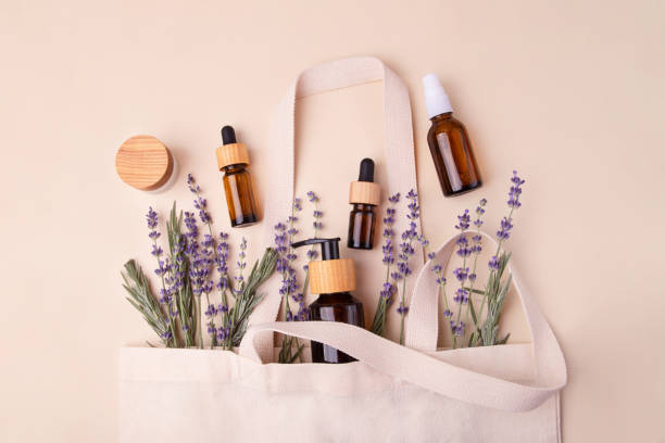 istock Open eco friendly cotton reusable bag with the different containers.Pastel colors.Natural lavender around.Concept of organic,zero waste cosmetics.Woman bag with accessories. 1428997066
