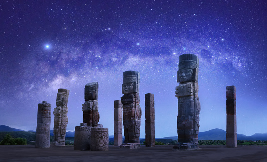 Esculturas toltecas en Tula sobre el fondo del cielo estrellado, México photo